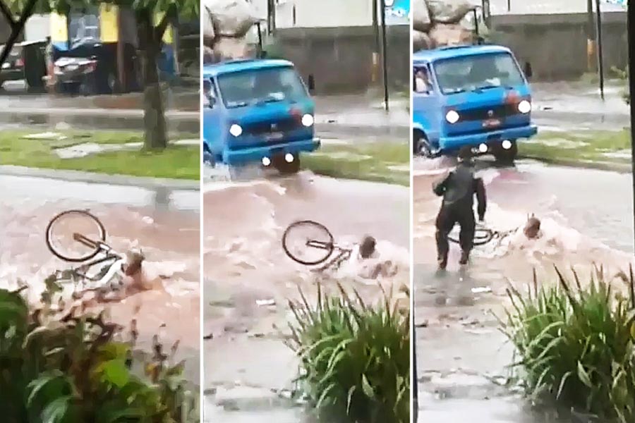 Ciclista cai e é arrastado pela enxurrada durante temporal em Goiânia